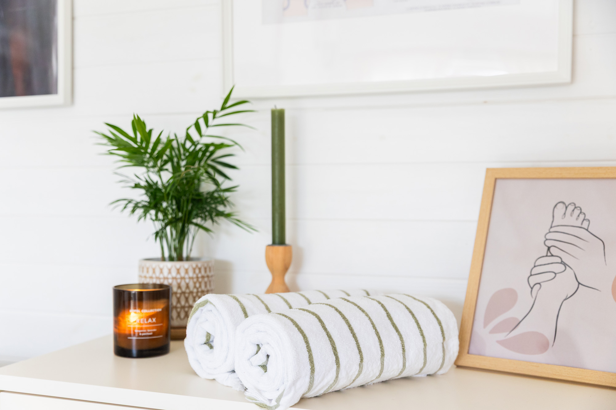 towels candles on reflexology room representing busines photography in nottingham
