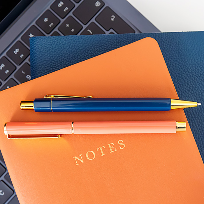 notebooks laptop and pens on brand for seo consultancy in nottingham spotight lane