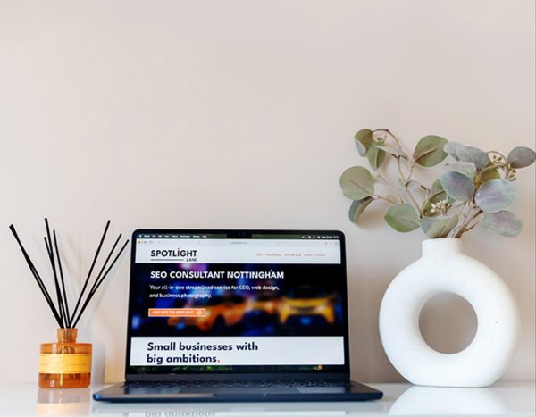 laptop mockup with Spotlight Lane seo consultancy in Nottingham offering website audits